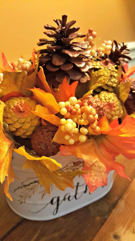 fall floral arrangement with painted pine cones