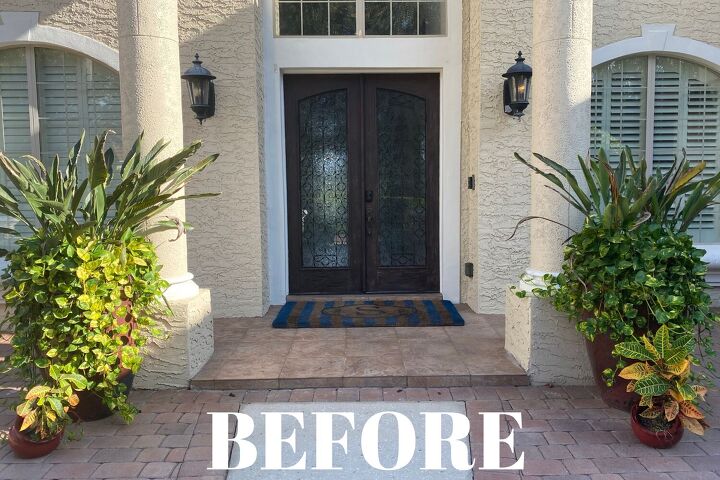 fall door decor using hay bales and fairy lights