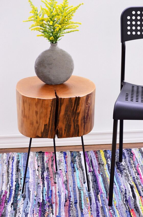 s 16 clever upcycles that resulted in expensive looking decor, This rustic tree stump side table