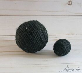 Wrap 2 balls in yarn for a quick craft that might give you chills