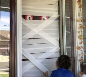 s 12 last minute halloween decor ideas that ll freak out your neighbors, A not so scary mummy door
