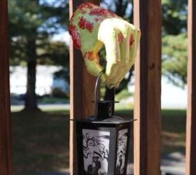 s 12 last minute halloween decor ideas that ll freak out your neighbors, This ghastly zombie hand