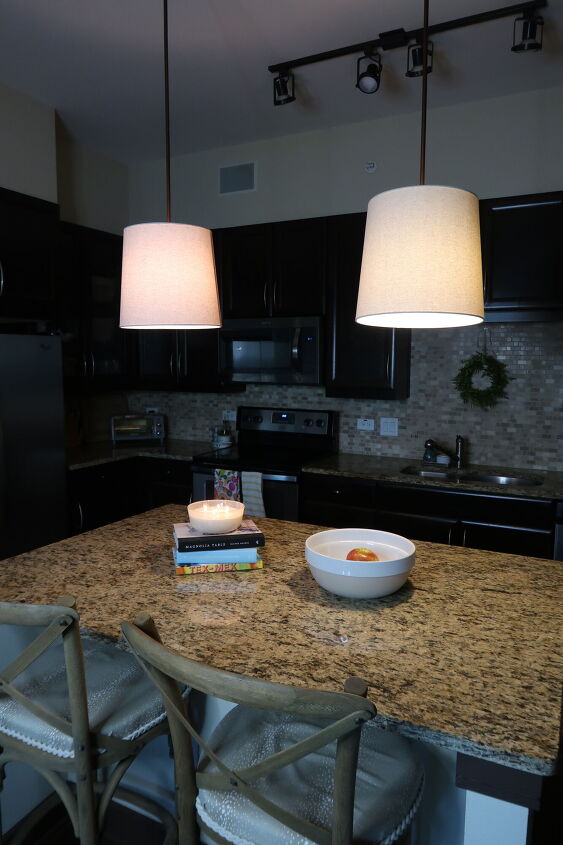 s 18 inexpensive ways to make your kitchen prettier and more organized, Cover your lights with lampshades
