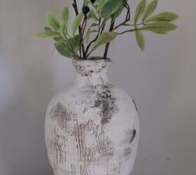 s 18 genius ways to get the anthropologie look on a budget, Smear gritty mud on your vase