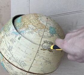 She cuts the top off an old globe & ends up with this totally unique fall idea