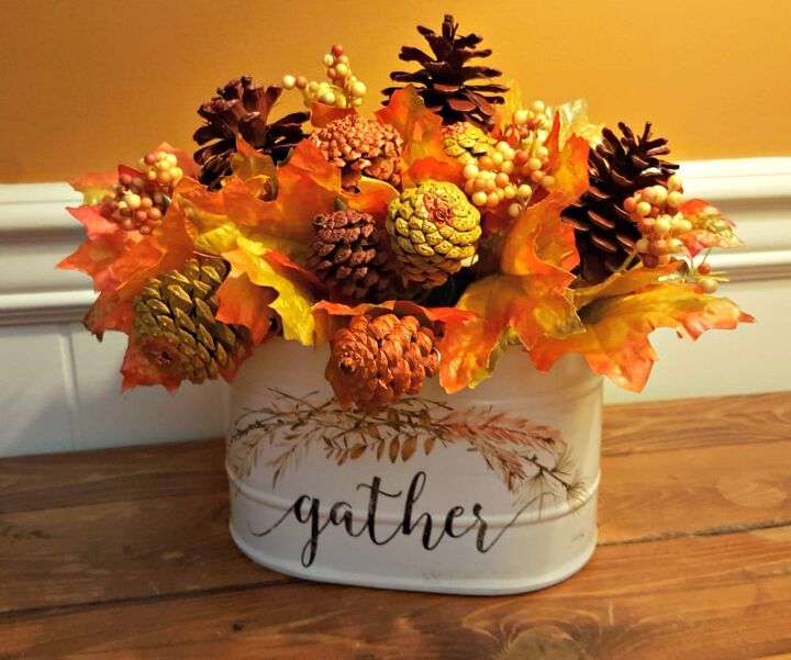 s 16 wild ways people are using pine cones this season, This festive fall arrangement