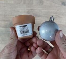 All you need is a mini ornament and a tiny flower pot to copy this ridiculously cute Christmas idea