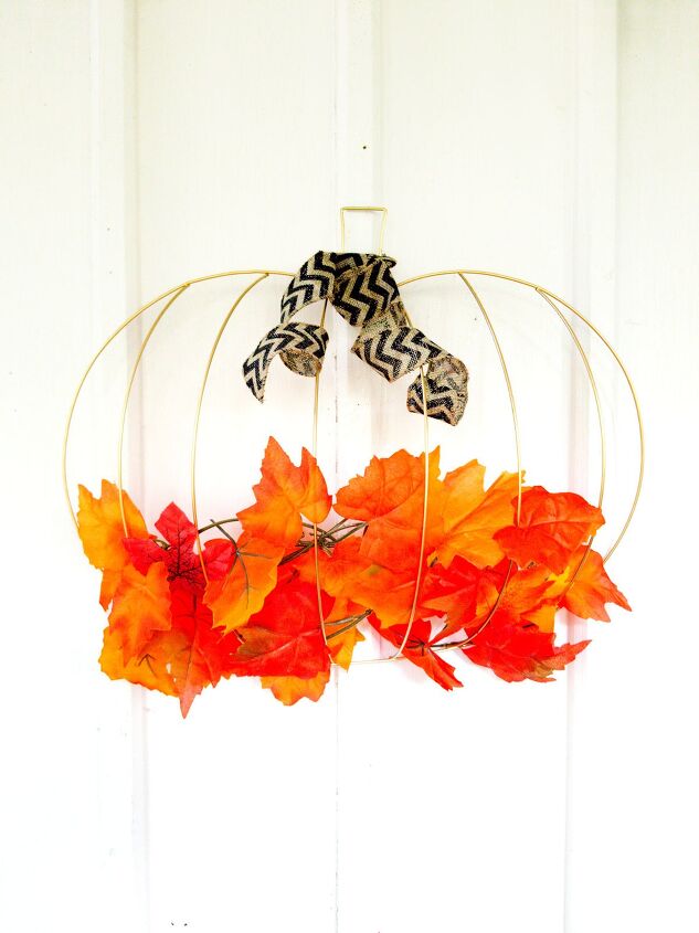 s 10 different ways to use those pumpkin wire wreath forms, This simple leafy wreath