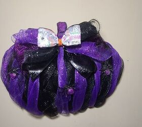 s 10 different ways to use those pumpkin wire wreath forms, This spooky mesh Halloween pumpkin