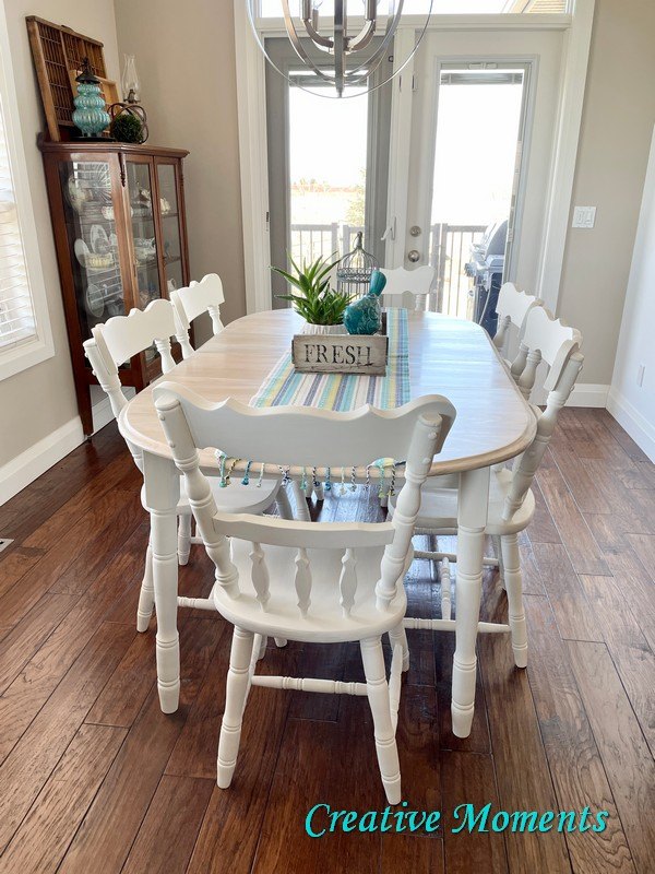 s 14 ways to make your old dining table look better before thanksgiving, Freshen it up with white stain