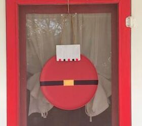 s 9 genius home decor hacks using a 1 pizza pan, His cute Christmas door hanger
