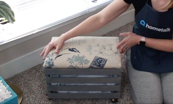 s 10 incredible ways to turn michaels crates into home decor, A weathered rolling ottoman