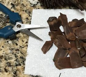 She uses a pine cone and a birdhouse for one of the cutest Christmas ideas we've ever seen