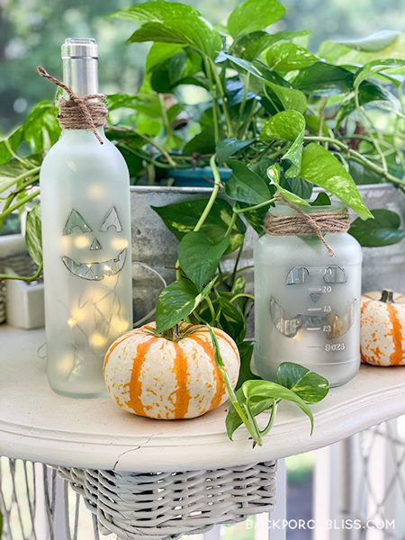 s 15 new uses for glass jars we can t wait to try, These fresh faced jack o lantern luminaries
