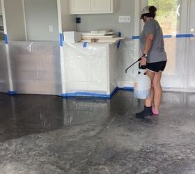acid staining concrete floors, Spraying the first coat of stain