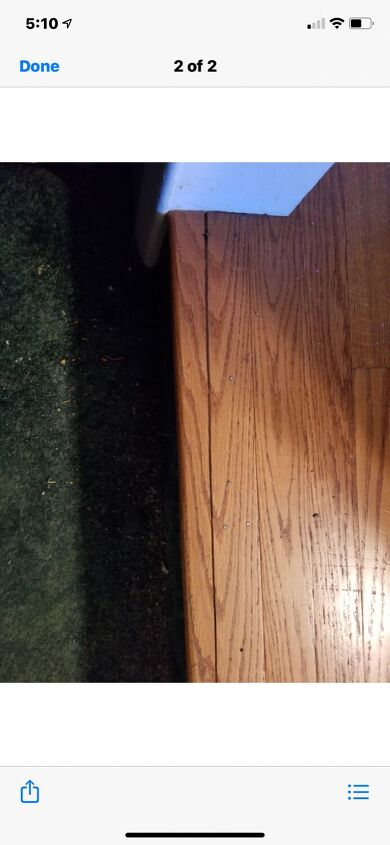 q fix a crack in my wood floor