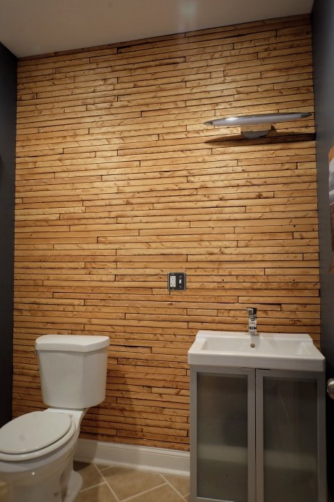 s 15 showstopping ideas that ll make guests gather in your bathroom, Nail wood laths to your wall