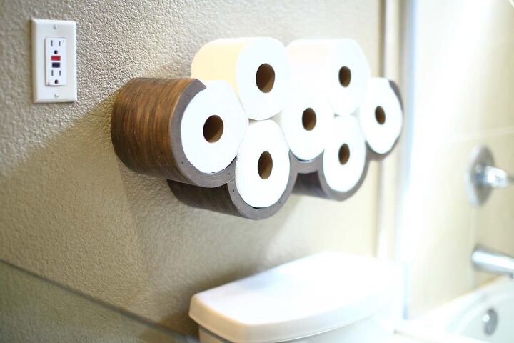 s 15 showstopping ideas that ll make guests gather in your bathroom, Design a stylish TP holder