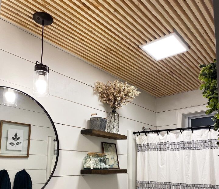 s 15 showstopping ideas that ll make guests gather in your bathroom, Update your ceiling with slats