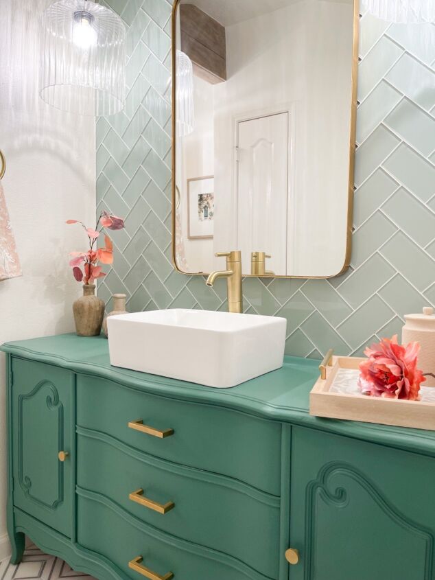 s 15 showstopping ideas that ll make guests gather in your bathroom, Use a dresser as a gorgeous vanity