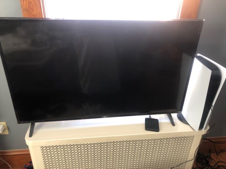 q can i keep electronics on top of my radiator cover during the winter