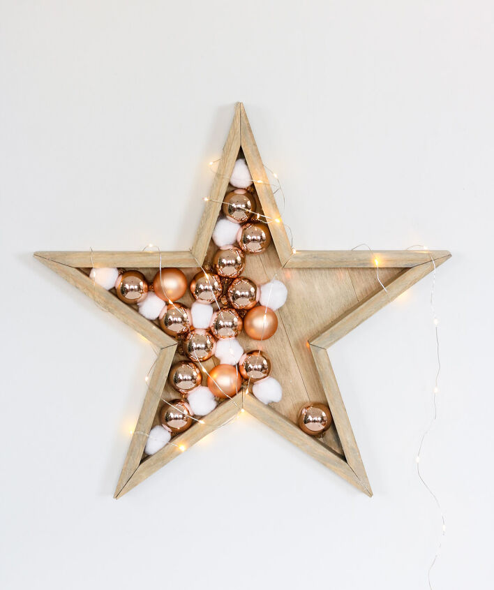 14 formas mgicas de utilizar las luces navideas esta temporada, Estrellas de madera DIY STAR LAMP