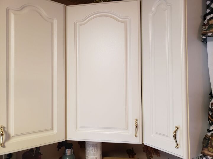 q how to fix kitchen corner cabinet hinge