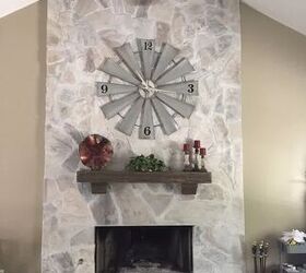 how to paint a stone fireplace for a breathtaking transformation, whitewashed stone fireplace with wood mantle and windmill wall clock