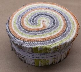 She buys a whole jelly roll of fabric strips to copy this easy & impressive fall accent