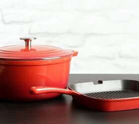 how to clean enameled cast iron, two red enameled cast iron cookware pieces