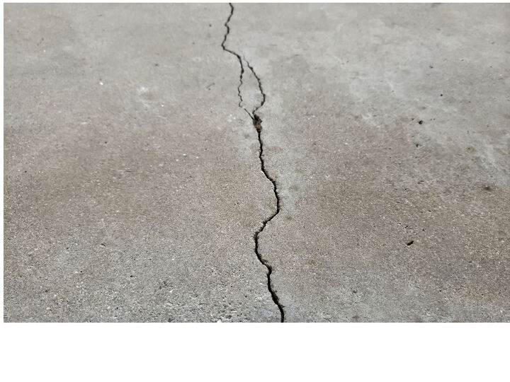 how to fix cracks in a concrete patio yourself, hairline crack runs through concrete