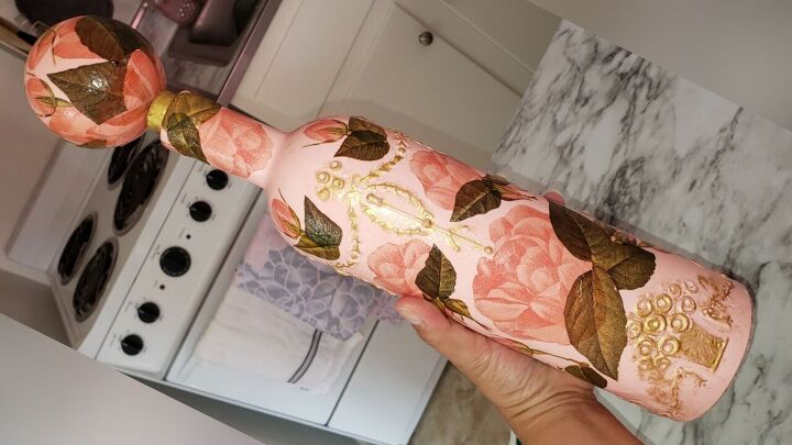 diy rose wine bottle decor with matching topper