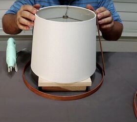 how to make a simple but beautiful paint stick lamp, Start gluing the paint stirrers to the hoop