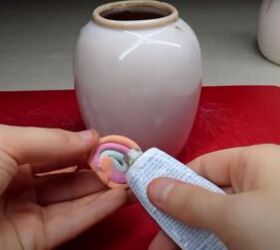 how to decorate a ceramic vase, Adding glue to the swirl decoration