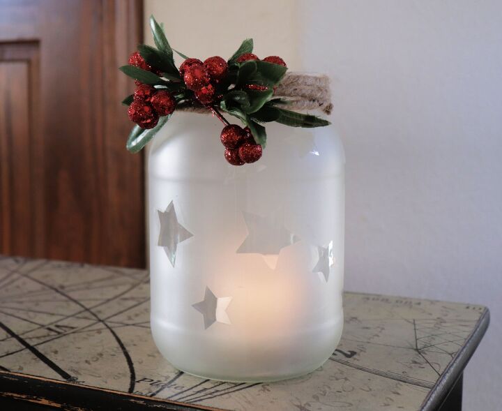 s save your leftover pickle jars for a gorgeous glowing christmas idea, A sweet farmhouse style lantern