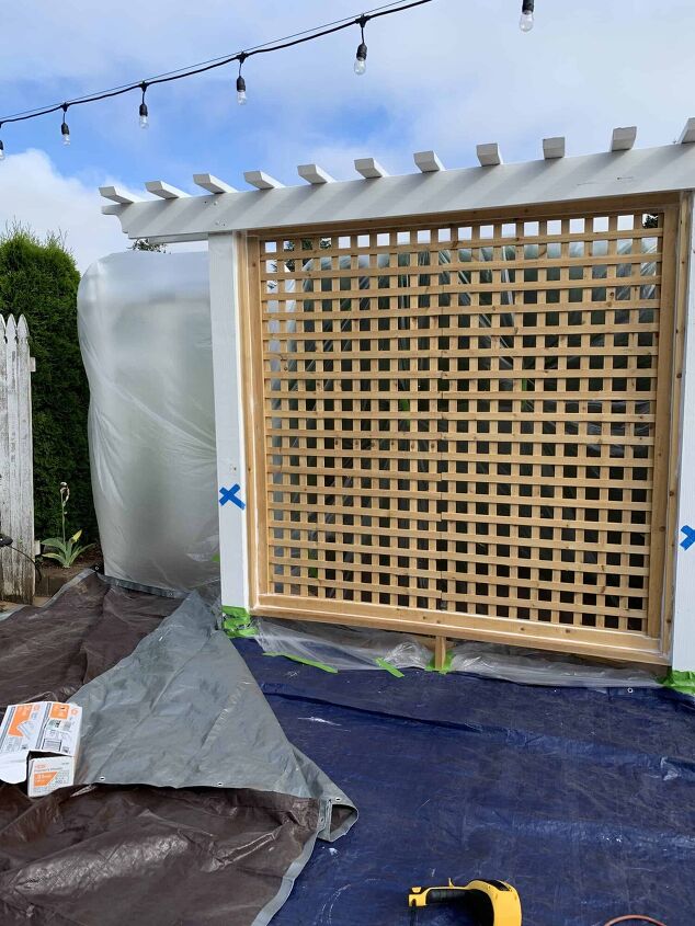 how to create a lattice wall in your garden, Everything is all taped off and ready for paint