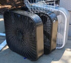 how to clean a box fan in under 10 minutes, two black box fans and one white box fan lined up on a sidewalk
