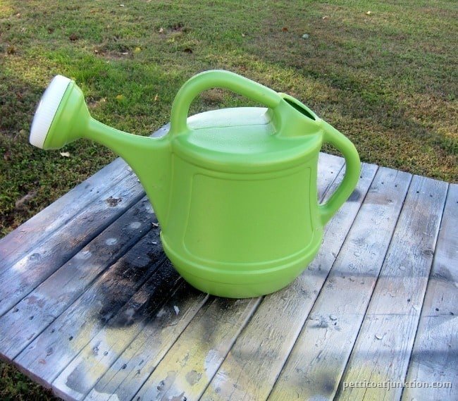 plastic watering can gets a metallic paint finish