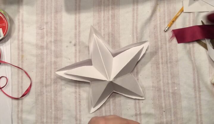como fazer uma estrela de papel 3d