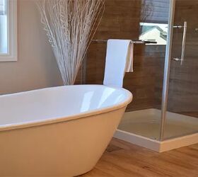 how to deep clean a bathroom, white bathtub and glass door shower