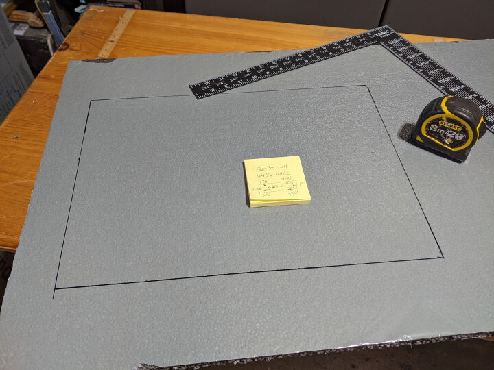 how i winterized my cheap garage door, Cutting out for windows