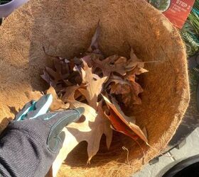 Toss leaves into a planter basket for this quick & pretty winter porch hack