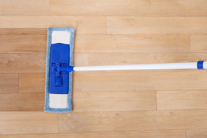 how to clean hardwood floors naturally and without damaging them, blue dust mop against hardwood floors