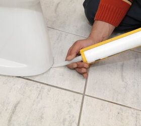 how to fix a wobbly toilet in a matter of minutes, caulking around the base of a toilet