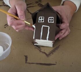 the easiest milk carton gingerbread house in a few steps, Painting the seams of the milk carton gingerbread house