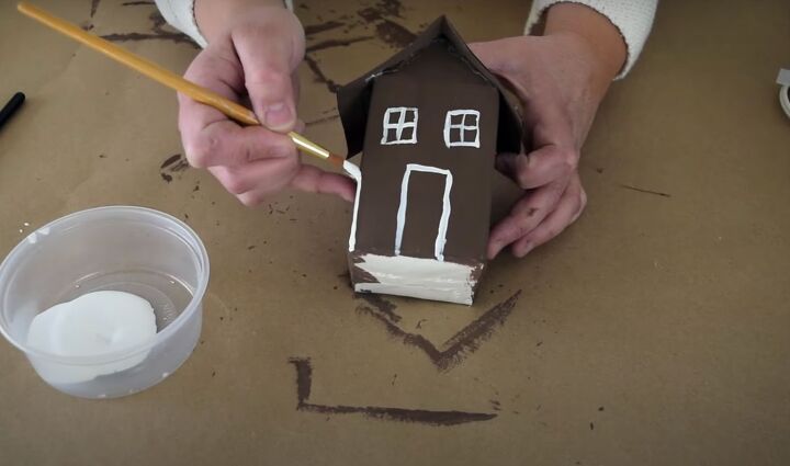 the easiest milk carton gingerbread house in a few steps, Painting the seams of the milk carton gingerbread house