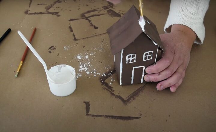 the easiest milk carton gingerbread house in a few steps, Adding a snowy effect to the roofline of the milk cartonhouse