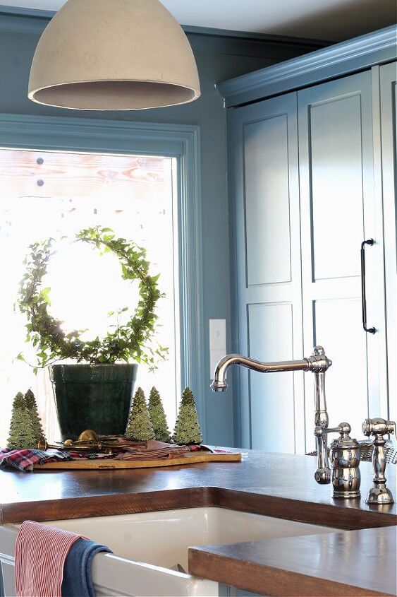 how to make an ivy topiary from a wire hanger, My topiary currently lives on our kitchen island See it in our Christmas Home Tour