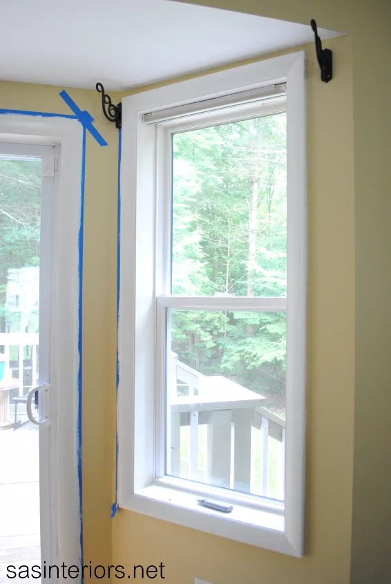 how to paint trim perfectly every time, painter s tape around freshly painted window trim