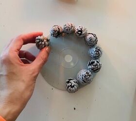 Spray paint an old CD for this 30-minute countertop accent idea